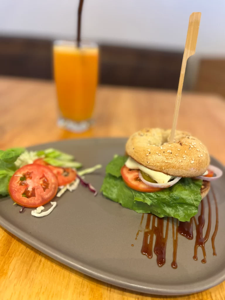 Halloumi bagel with bbq sauce and salad at Poached Breakfast Cafe, Rawai, Phuket, Thailand. One of the best places to eat in Rawai.