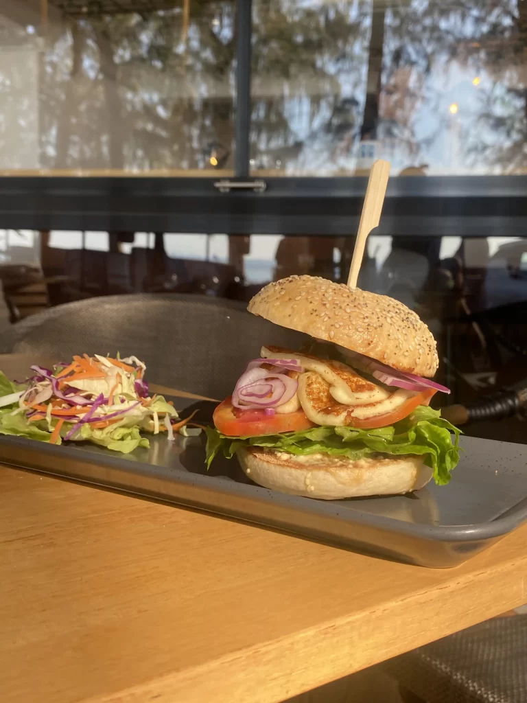 Halloumi bagel with onions, tomatoes, lettue and smokey bbq cream cheese. All this at the best place to start when you're wanting to explore the walking routes in Rawai: Poached Breakfast Cafe Rawai, Phuket, Thailand