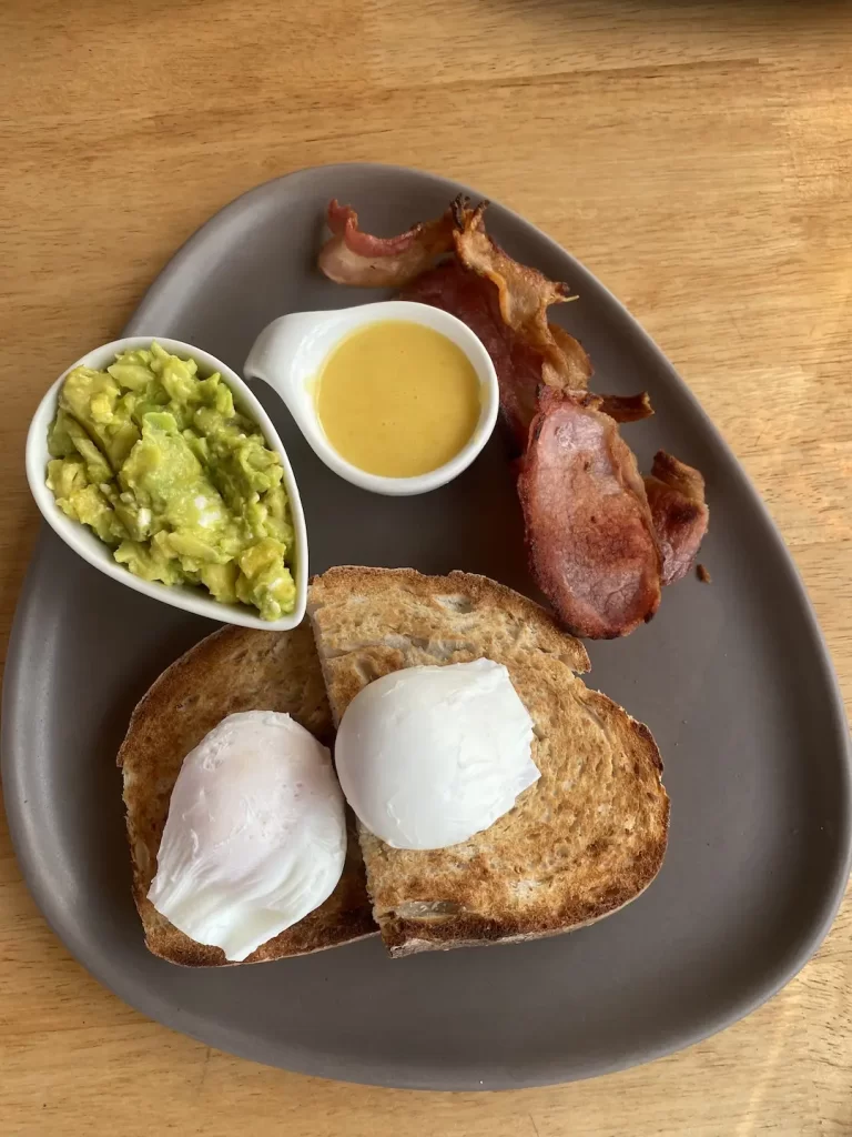 Bacon, egg and hollandaise at one of the best breakfast bars near Nai Harn, Poached Breakfast Cafe Rawai, Phuket, Thailand