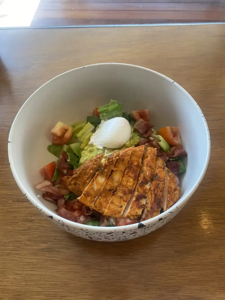 Cobb salad with bacon and egg at the best place to fuel up before going trekking near Nai Harn: Poached Breakfast Cafe Rawai, Phuket, Thailand