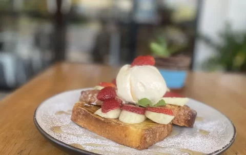 French toast with banana, ice cream and strawberries at one of the best breakfast bars near Nai Harn, Poached Breakfast Cafe Rawai, Phuket, Thailand